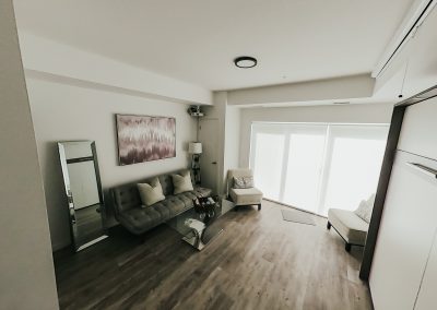 Living room with hideaway bed, R & R Property Management